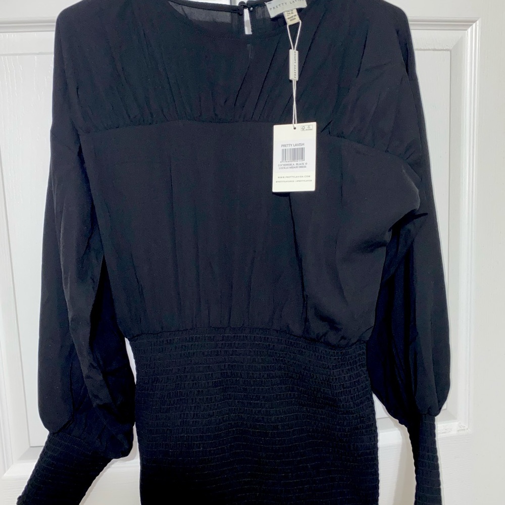 A black body con type dress. It has not been worn because it is not my size.